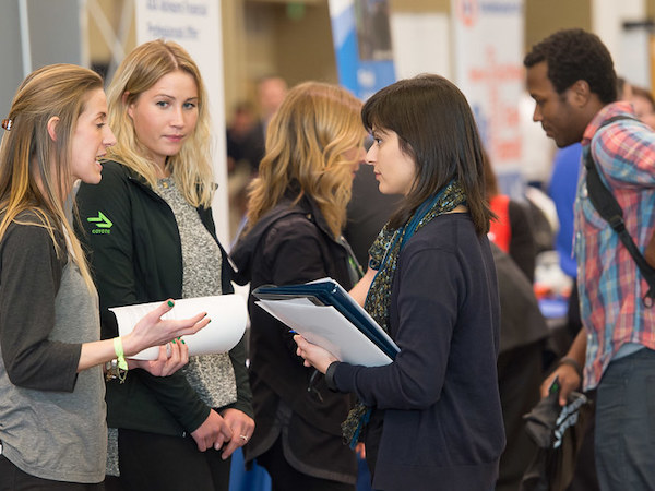 Students networking at a career fair
